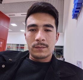 Али